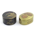 An Oriental brass snuff box / oval box with hinged lid, with shibayama style figural decoration to