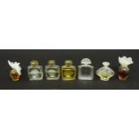A quantity of assorted miniature glass scent / perfume bottles, by Lalique, etc. (7) Please Note -