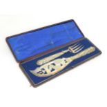 Cased silver plate fish servers with Georgian dolphin detail to handles Please Note - we do not make