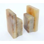 A pair of alabaster bookends formed as books, each approx 6" tall. (2) Please Note - we do not