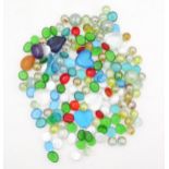 A quantity of assorted glass marbles, pebbles etc Please Note - we do not make reference to the