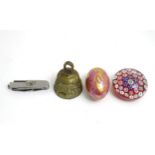 Items to include brass bell, glass paperweight, Rockingham China egg formed pot and cover and pocket