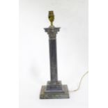 A silver plate table lamp modelled as a Corinthian column. Approx. 17" high Please Note - we do