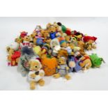 Toys: A quantity of assorted soft toys to include Disney Store Winnie The Pooh toys etc Please