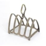 A silver plate five bar toast rack by Boots Pure Drug Company Please Note - we do not make reference