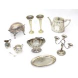 A quantity of assorted silver plated wares to include bud vases, teapot, milk jug, sugar bowl etc.