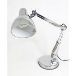 An adjustable Anglepoise style lamp Please Note - we do not make reference to the condition of