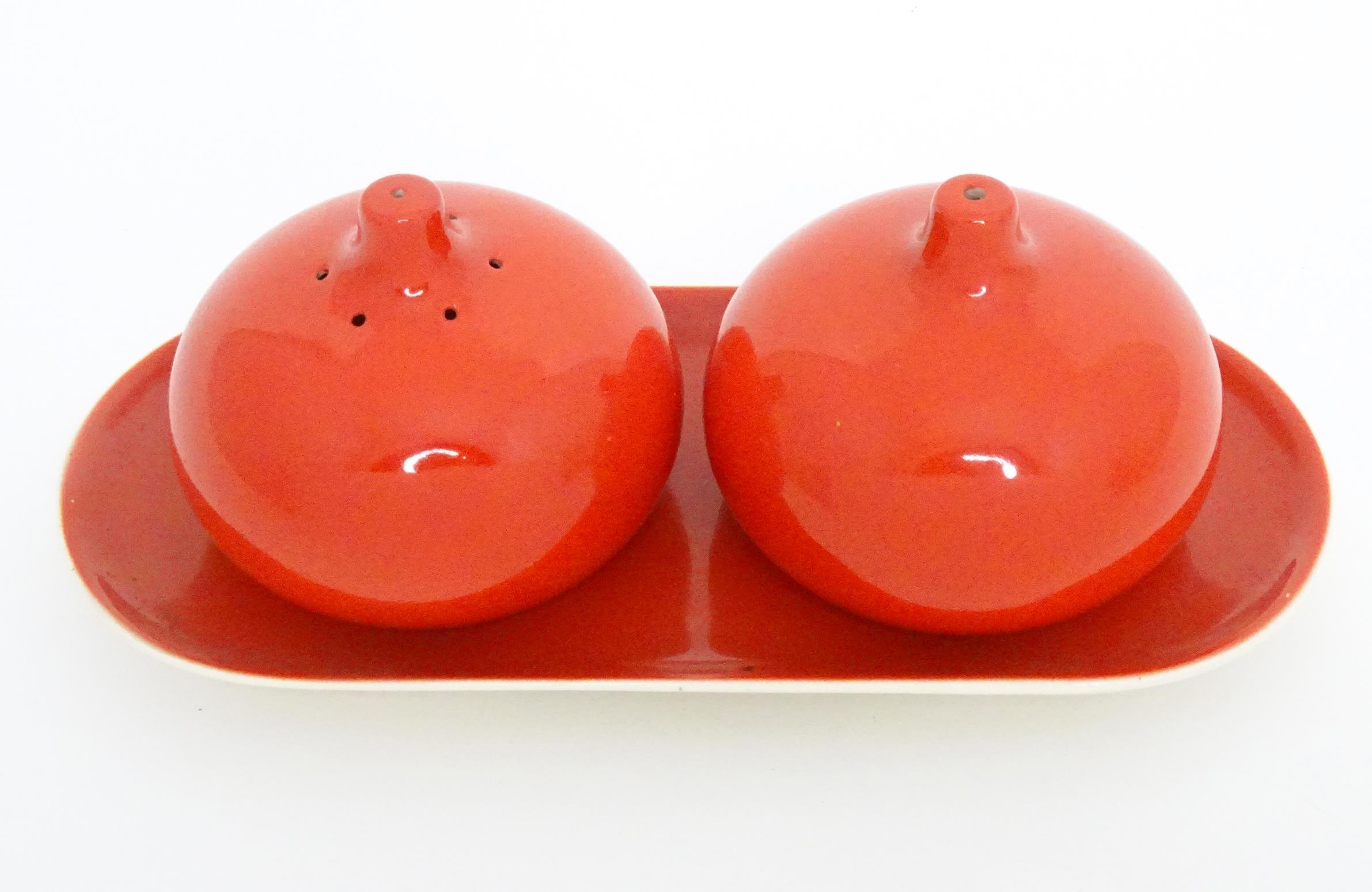 A Carlton Ware cruet set on stand with a red glaze. Marked and impressed under 2955 Please Note - we - Image 3 of 6
