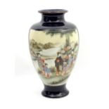 A Japanese vase decorated with figures in a landscape with mountains, flowers, etc. Marked under.