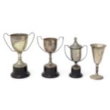 Four silver plate trophy cups, some engraved for Ampfield Golf Club. Tallest 9 1/2" high overall