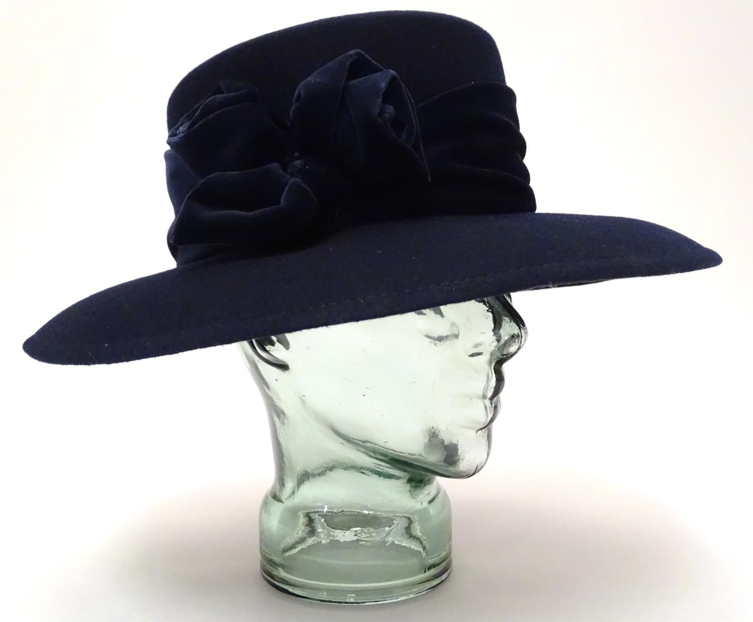 Vintage fashion and clothing: A ladies navy felt hat Please Note - we do not make reference to the