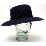 Vintage fashion and clothing: A ladies navy felt hat Please Note - we do not make reference to the