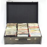A mid to late 20thC record / vinyl transit case containing a quantity of 1970's / 1980's 45rpm