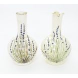 Two French studio pottery vases with hand painted lavender detail. Marked under Beaumont du