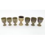 A quantity of assorted Scottish studio pottery goblets / pedestal cups, some with fern detail.