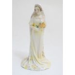 A Royal Doulton figure The Bride, model no. HN1588, Marked under. Approx. 9" high. Please Note -