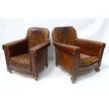 Two brown leather tub chairs raised on bun feet Please Note - we do not make reference to the