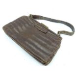 A vintage crocodile handbag with purse and mirror Please Note - we do not make reference to the