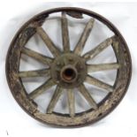An old cart wheel. Approx 36" diameter Please Note - we do not make reference to the condition of