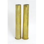 A pair of trenchart style shells . Approx 11 1/2" high Please Note - we do not make reference to the