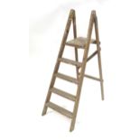 A late 19thC / early 20thC wooden ladder 53" high Please Note - we do not make reference to the