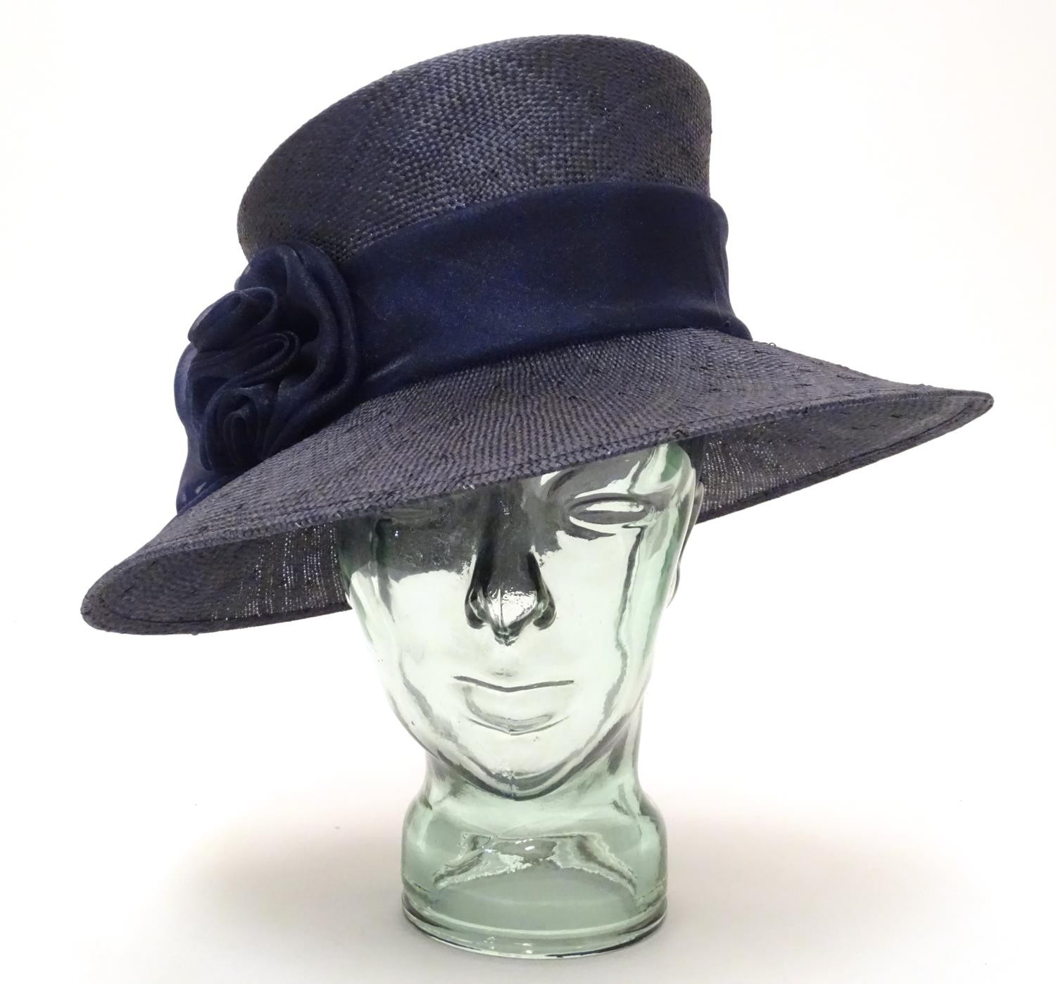 Vintage fashion and clothing: A ladies navy hat Please Note - we do not make reference to the