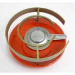 A Swiss retro paraffin ring by Teba. 8" diameter Please Note - we do not make reference to the