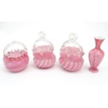 Assorted art glass to include glass baskets with pink and white ribbon detail and clear glass