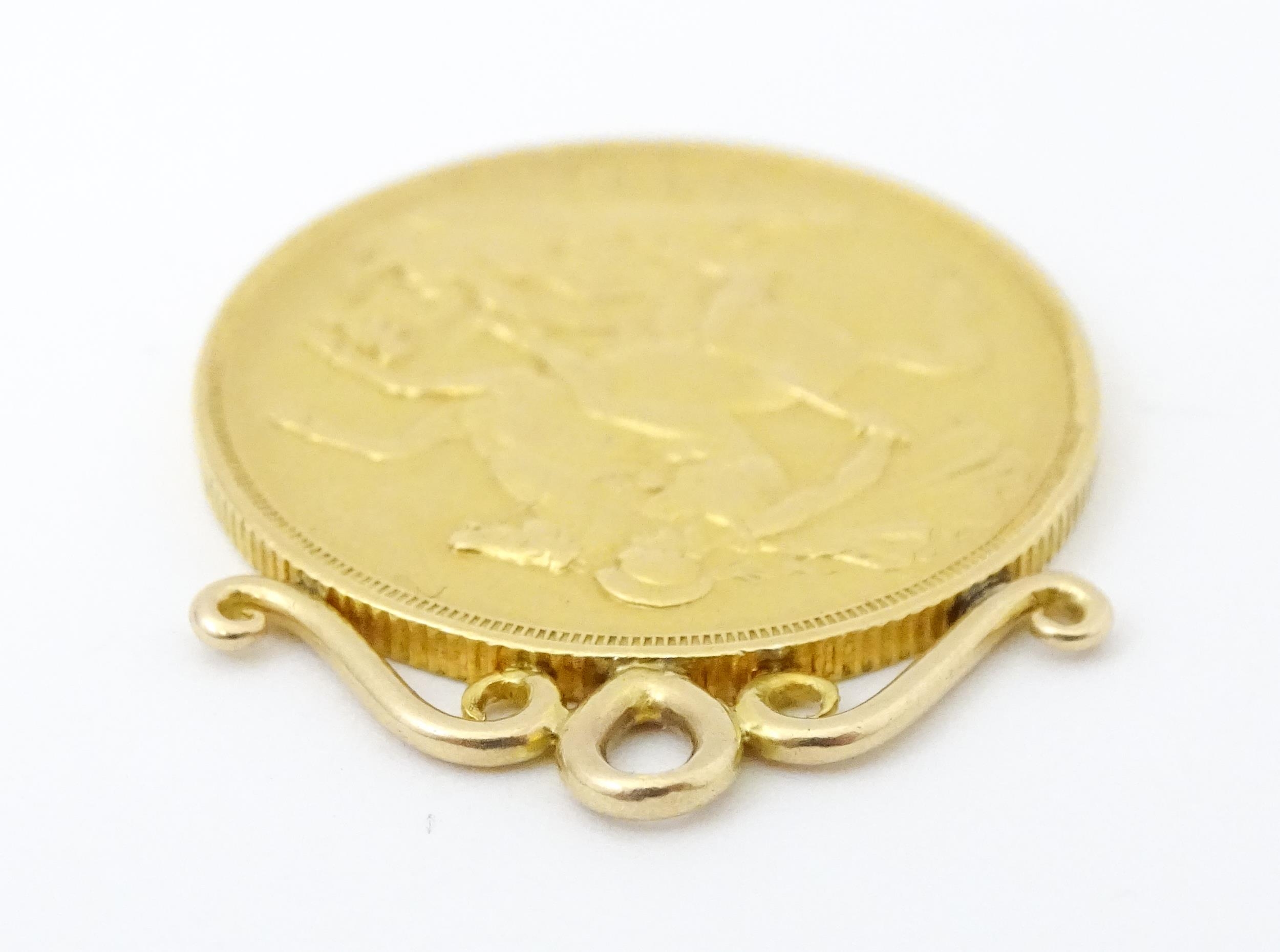 A pendant formed as a Victorian 2 pound / double sovereign with hanging mount to top. Approx 1 1/ - Image 2 of 5