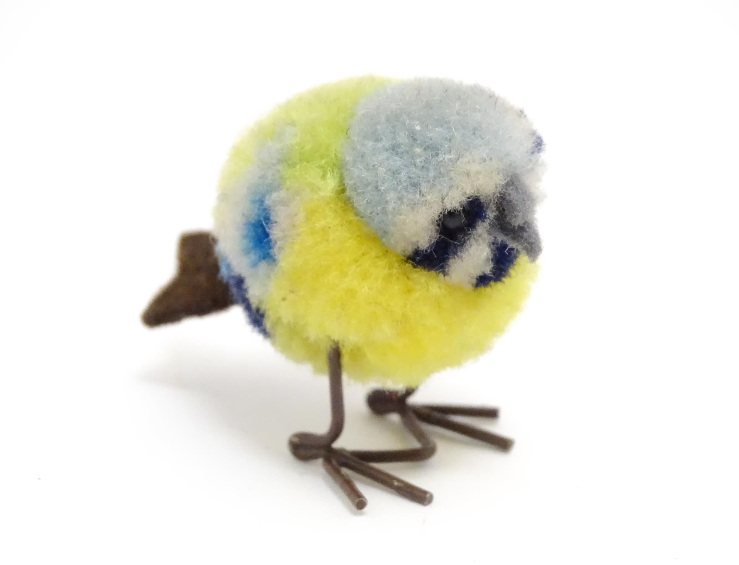 Toy: An early 20thC Steiff woollen model of a miniature blue tit bird, with felt tail and beak and - Bild 2 aus 5