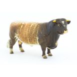 A Beswick model of a Dairy Shorthorn Bull. Marked and titled under Ch. / Champion Gwersylt Lord