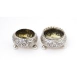 Two Victorian silver salts with embossed decoration, one hallmarked Birmingham 18189 / 1890 maker