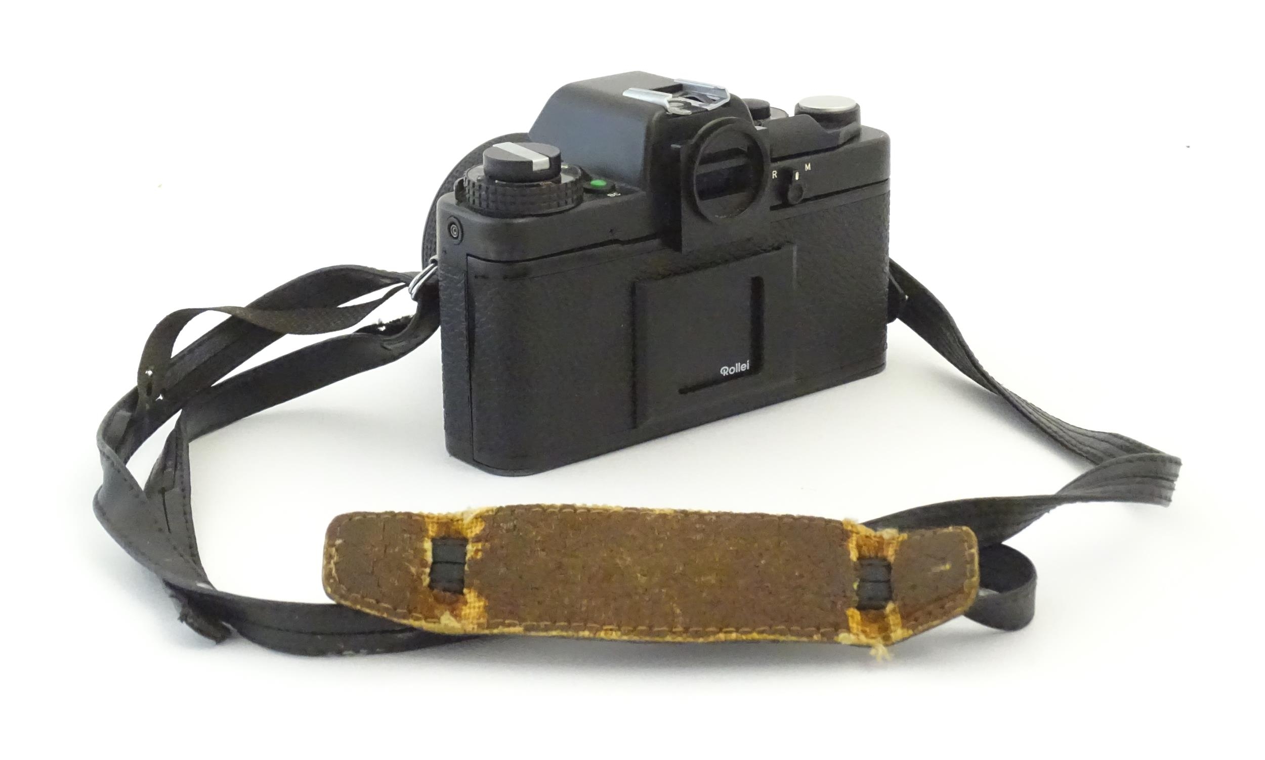 A Rolleiflex SL35 E 35mm film camera, c1970s, cased with lens cap. 5 1/8" Please Note - we do not - Bild 3 aus 10