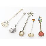 Five assorted salt spoons to include a silver example. Largest approx. 2 3/4" long (5) Please Note -