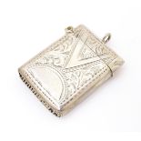 A silver vesta with engraved decoration, hallmarked Birmingham 1903 maker Arthur Cook. Approx. 1 1/