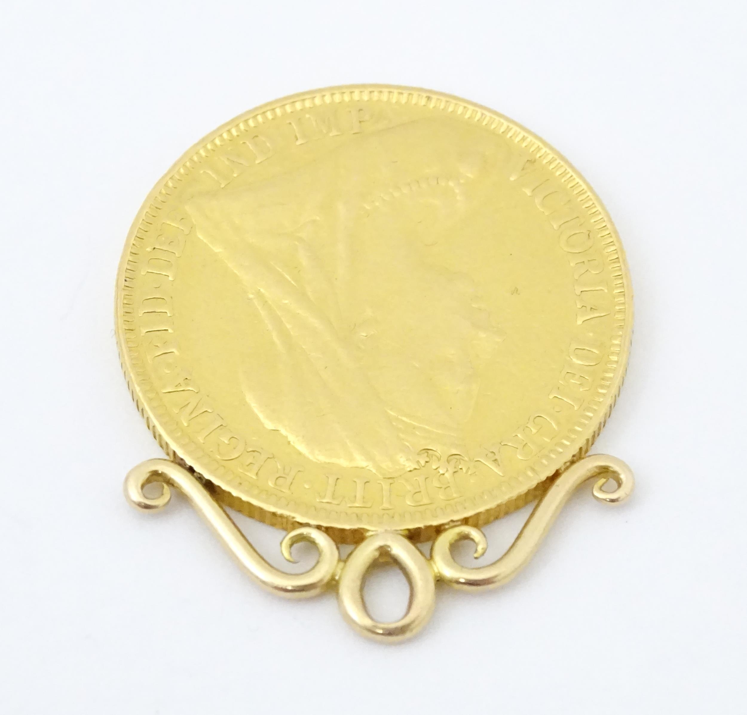 A pendant formed as a Victorian 2 pound / double sovereign with hanging mount to top. Approx 1 1/ - Image 3 of 5