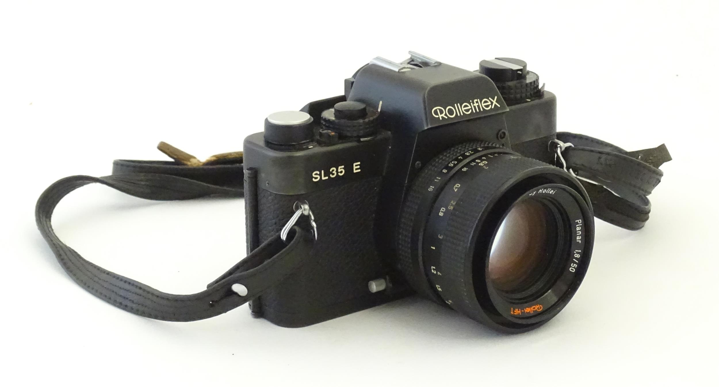 A Rolleiflex SL35 E 35mm film camera, c1970s, cased with lens cap. 5 1/8" Please Note - we do not - Bild 5 aus 10