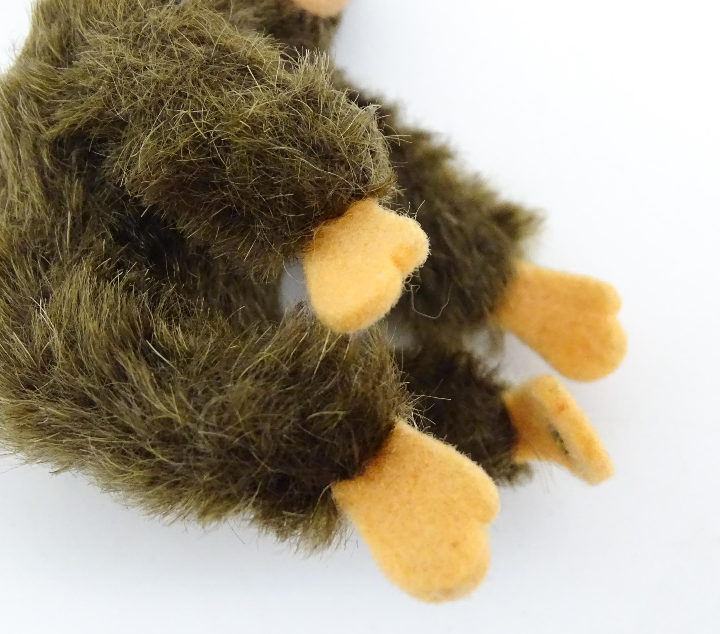 Toy: A small 20thC Steiff mohair soft toy modelled as a monkey / chimpanzee, with felt face, ears - Bild 5 aus 9