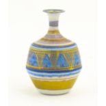 A small studio pottery vase by Mary Rich with banded and geometric detail. Impressed mark lower.
