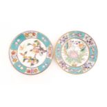 Two Oriental dishes, one decorated with a bird perched on a peach branch with a butterfly, the