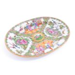 A Chinese / Cantonese famille rose plate / dish of oval form decorated with four panels, two