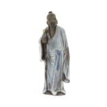A Chinese mud man figure depicted wearing robes. Approx. 7 1/4" high Please Note - we do not make