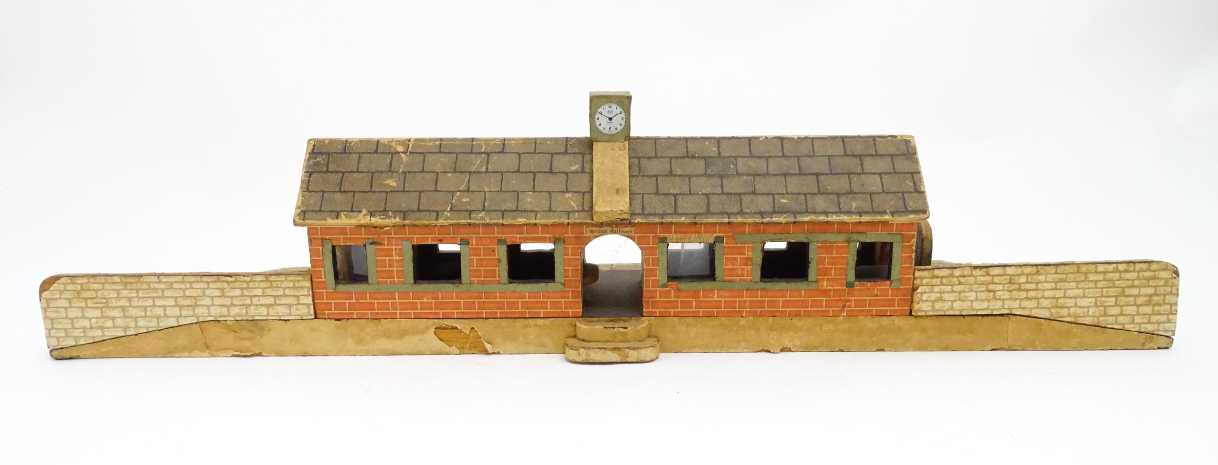 Toys: A 20thC scratch built wooden model railway station / platform with various adverts for - Bild 9 aus 10