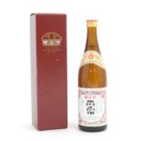 A boxed 720ml bottle of Japanese Yamamura 'Sakura Masamune' sake, the bottle approx 11 1/2" tall