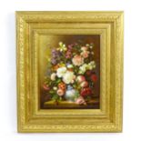 20th century, Oil on board, A still life study with flowers in bloom. Signed with monogram JA