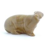 A ceramic model of a brown bear. Approx. 9" wide Please Note - we do not make reference to the