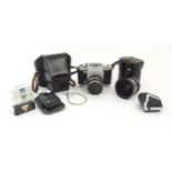A Pentacon Six TL camera with two Carl Zeiss Jena lenses - 2.8/80 biometar and 4/50 Flektagon (