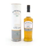 Scotch Whisky: A 1 litre bottle of Bowmore Islay single malt ' Surf' Scotch Whisky. Please Note - we