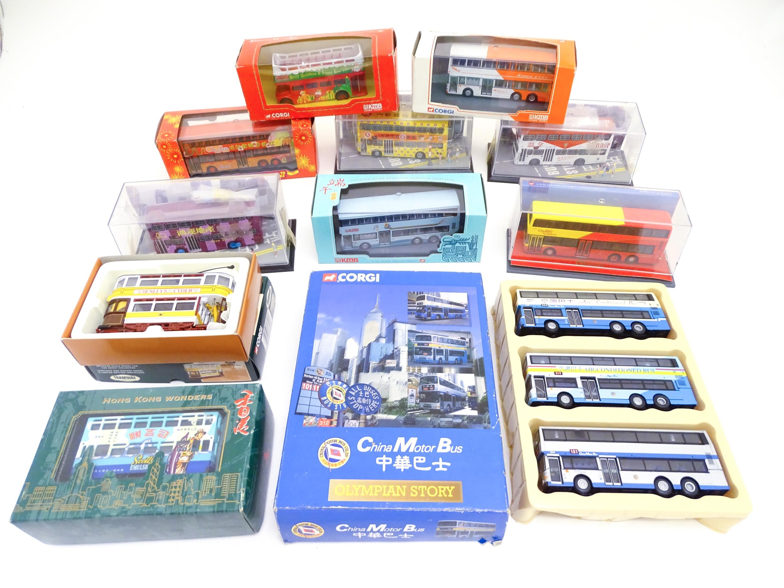 Toys: A quantity of assorted die cast scale model Corgi Far Eastern Buses to include KMB Christmas