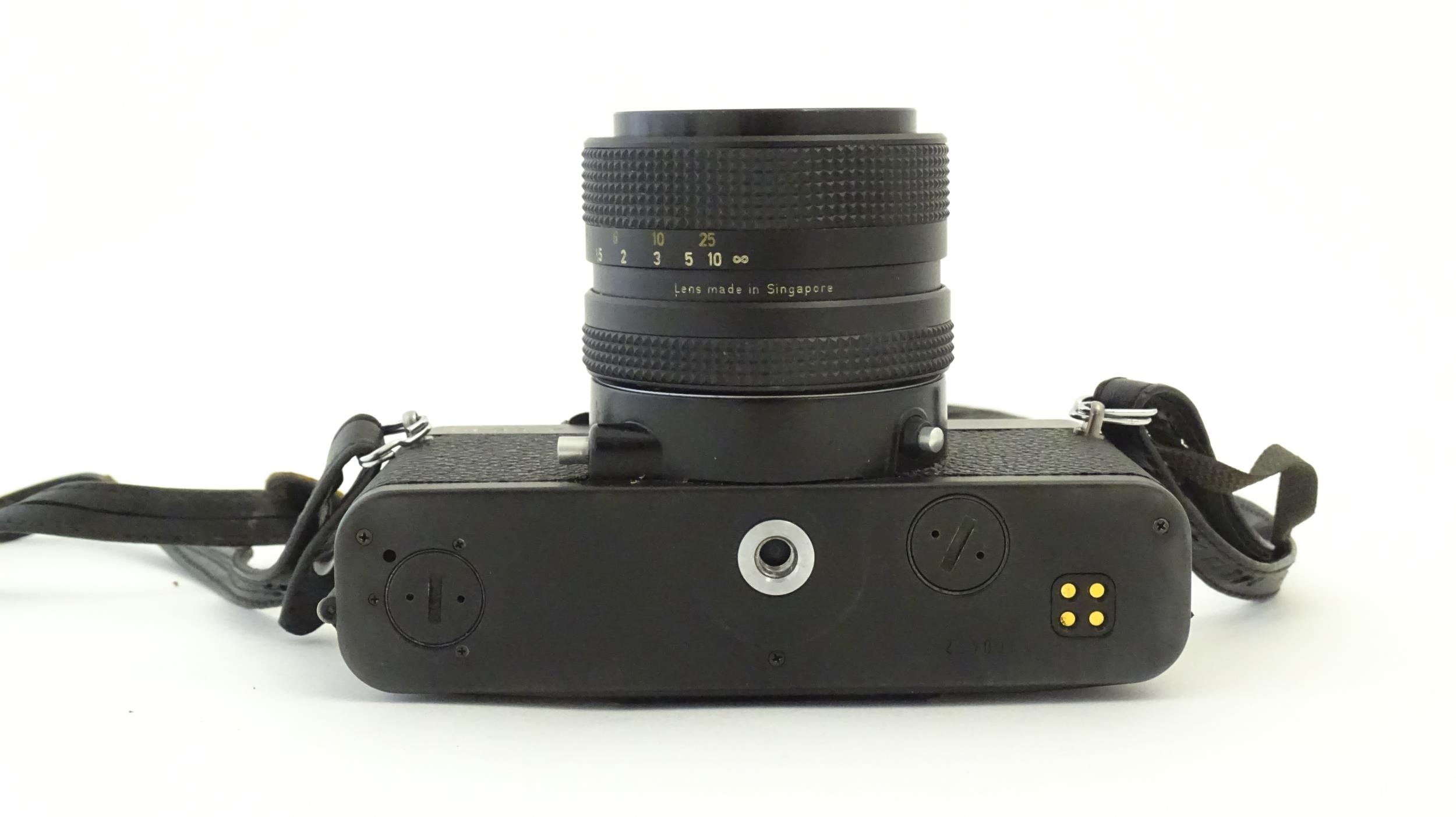 A Rolleiflex SL35 E 35mm film camera, c1970s, cased with lens cap. 5 1/8" Please Note - we do not - Bild 7 aus 10